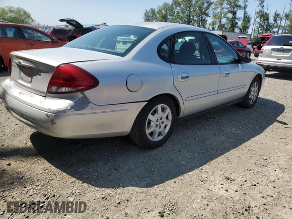 2005 Ford Taurus SE с VIN 1FAFP53U05A259841, выставлен на аукционе Copart как лот 57255835 с пробегом 179 821 миль миль и Списание • Salvage title. История ставок и продаж доступна на DreamBid. Изображение 3.