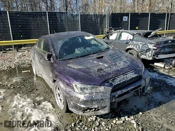 2014 Mitsubishi Lancer Evolution GSR z VIN JA32W8FV6EU010233, wystawiony jako Copart lot #42787275 z przebiegiem 74 780 mil mil oraz Szkody całkowita. Historia ofert i sprzedaży dostępna na DreamBid. Obrazek 10.