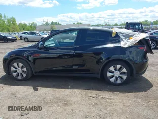 2023 Tesla Model Y Long Range with VIN 7SAYGDEE0PA183891, listed as a IAAI auction lot 42205573 with 41,273 mi miles and . Bid and sale history available at DreamBid. Image 14.