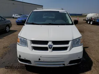 2009 Dodge Grand Caravan with VIN 1D8HN11E99B505784, listed as a Copart auction lot 60590065 with 195,488 mi miles and Salvage title. Bid and sale history available at DreamBid. Image 5.