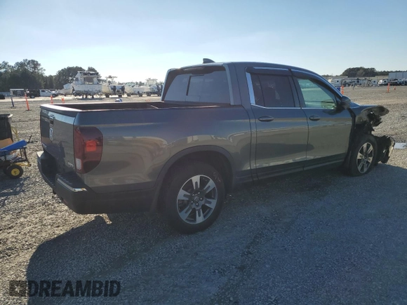 2019 Honda Ridgeline RTL-T with VIN 5FPYK3F63KB012214, listed as a Copart auction lot 41740585 with 33,965 mi miles and Salvage title. Bid and sale history available at DreamBid. Image 3.