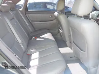 2003 Toyota Avalon XL z VIN 4T1BF28B33U293202, wystawiony jako IAAI lot #41768148 z przebiegiem 157 992 mil mil oraz . Historia ofert i sprzedaży dostępna na DreamBid. Obrazek 8.