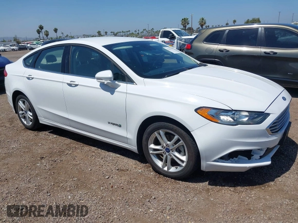 2018 Ford Fusion SE z VIN 3FA6P0LU2JR261268, wystawiony jako IAAI lot #42301578 z przebiegiem 63 357 mil mil oraz . Historia ofert i sprzedaży dostępna na DreamBid. Obrazek 1.