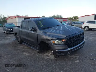 2023 Ram 1500 Big Horn with VIN 1C6RRFFG1PN644440, listed as a IAAI auction lot 42155974 with 30,502 mi miles and . Bid and sale history available at DreamBid. Image 1.