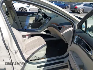 2016 Lincoln MKZ with VIN 3LN6L2J93GR618252, listed as a IAAI auction lot 41890213 with 96,414 mi miles and . Bid and sale history available at DreamBid. Image 5.