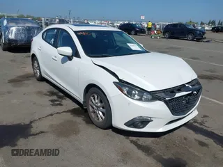 2016 Mazda 3 i Touring with VIN JM1BM1W74G1291307, listed as a IAAI auction lot 42106234 with 164,178 mi miles and . Bid and sale history available at DreamBid. Image 1.
