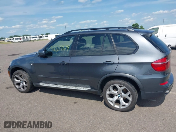 2012 BMW X5 35d with VIN 5UXZW0C56CL664575, listed as a IAAI auction lot 42559674 with 157,554 mi miles and . Bid and sale history available at DreamBid. Image 14.