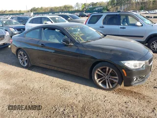 2014 BMW 4 Series 428i xDrive with VIN WBA3N9C55EF721295, listed as a IAAI auction lot 42139256 with 85,472 mi miles and . Bid and sale history available at carsss.com. Image 1.