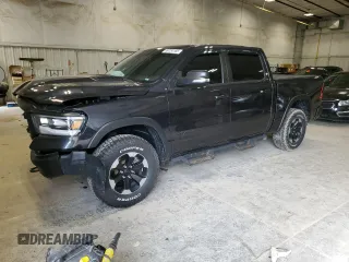 2020 Ram 1500 Rebel with VIN 1C6SRFLT3LN105329, listed as a Copart auction lot 59734165 with 89,407 mi miles and Salvage title. Bid and sale history available at DreamBid. Image 1.