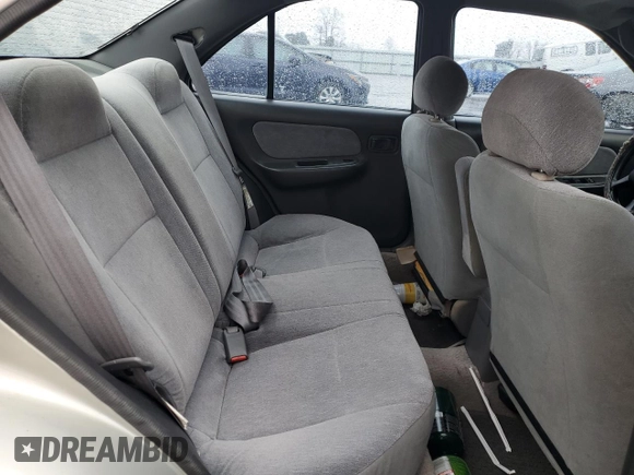 1996 Nissan Sentra XE z VIN 1N4AB41D2TC767557, wystawiony jako Copart lot #42553245 z przebiegiem 148 514 mil mil oraz Szkoda całkowita • Salvage title. Historia ofert i sprzedaży dostępna na DreamBid. Obrazek 11.