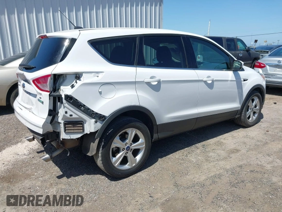 2015 Ford Escape SE with VIN 1FMCU0G91FUC65044, listed as a IAAI auction lot 42083688 with 111,972 mi miles and . Bid and sale history available at carsss.com. Image 4.