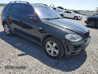 2011 BMW X5 35d with VIN 5UXZW0C58BL662048, listed as a Copart auction lot 55648975 with 166,291 mi miles and Salvage title. Bid and sale history available at DreamBid. Image 4.