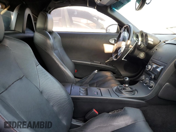 2004 Nissan 350Z Touring with VIN JN1AZ36A34T010010, listed as a Copart auction lot 64837084 with 97,180 mi miles and Salvage Title. Bid and sale history available at carsss.com. Image 7.