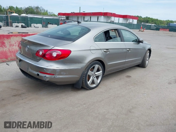 2012 Volkswagen CC Lux PZEV with VIN WVWHP7AN0CE552624, listed as a IAAI auction lot 42134600 with 122,543 mi miles. Bid and sale history available at carsss.com. Image 4.