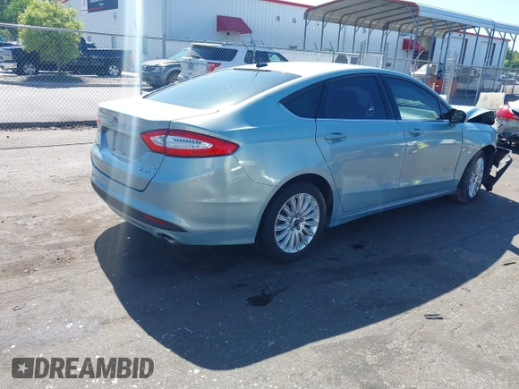 2014 Ford Fusion SE Hybrid with VIN 3FA6P0LU3ER373311, listed as a IAAI auction lot 42048513 with 155,935 mi miles. Bid and sale history available at carsss.com. Image 4.