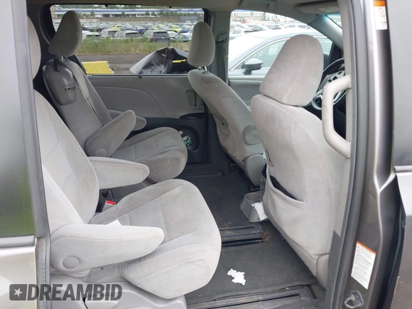 2015 Toyota Sienna LE AAS with VIN 5TDKK3DC7FS619418, listed as a IAAI auction lot 42553836 with 116,190 mi miles and . Bid and sale history available at DreamBid. Image 8.