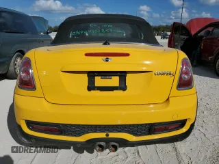 2015 MINI Roadster S z VIN WMWSY3C53FT595389, wystawiony jako Copart lot #77476814 z przebiegiem Nie podano mil oraz Szkody całkowita. Historia ofert i sprzedaży dostępna na DreamBid. Obrazek 6.