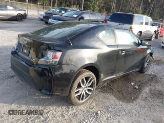 2015 Scion tC z VIN JTKJF5C71FJ009326, wystawiony jako IAAI lot #41588230 z przebiegiem 283 796 mil mil oraz . Historia ofert i sprzedaży dostępna na DreamBid. Obrazek 4.