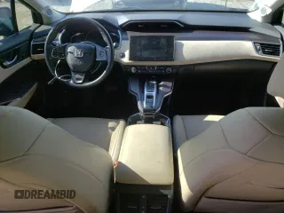 2018 Honda Clarity Touring z VIN JHMZC5F33JC002904, wystawiony jako Copart lot #55535325 z przebiegiem Nie podano mil oraz Szkoda całkowita • Salvage title. Historia ofert i sprzedaży dostępna na DreamBid. Obrazek 8.