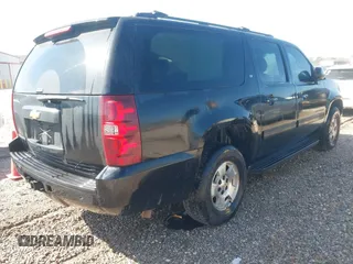 2014 Chevrolet Suburban LT with VIN 1GNSCJE00ER198703, listed as a IAAI auction lot 41952805 with 228,579 mi miles and . Bid and sale history available at DreamBid. Image 4.