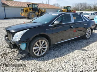 2013 Cadillac XTS Luxury with VIN 2G61P5S37D9106674, listed as a Copart auction lot 52405195 with 159,737 mi miles and Clean Title. Bid and sale history available at carsss.com. Image 1.