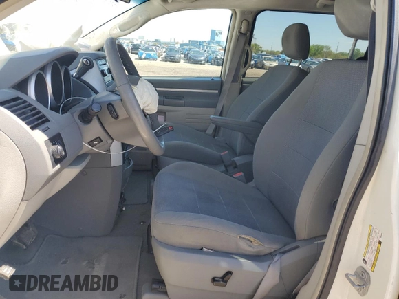 2009 Dodge Grand Caravan SXT z VIN 2D8HN54139R548082, wystawiony jako Copart lot #55882315 z przebiegiem 231 102 mil mil oraz Szkoda całkowita • Salvage title. Historia ofert i sprzedaży dostępna na DreamBid. Obrazek 7.