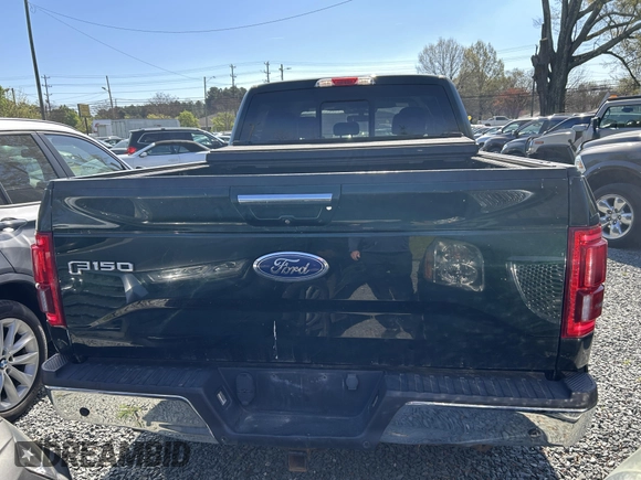 2016 Ford F-150 XLT with VIN 1FTFW1EG4GKE48227, listed as a IAAI auction lot 41907752 with 233,964 mi miles. Bid and sale history available at carsss.com. Image 6.