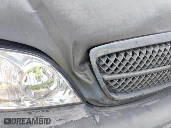 2004 Kia Sedona LX with VIN KNDUP131346533373, listed as a IAAI auction lot 41632342 with 76,545 mi miles. Bid and sale history available at carsss.com. Image 12.