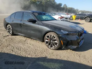 2024 BMW 5 Series 530i with VIN WBA43FJ06RCP88933, listed as a Copart auction lot 77122854 with 10,914 mi miles and Salvage Title. Bid and sale history available at carsss.com. Image 4.