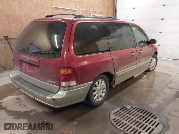 2003 Ford Windstar LTD with VIN 2FMDA58433BB41744, listed as a IAAI auction lot 41385411 with 186,368 mi miles and . Bid and sale history available at carsss.com. Image 4.