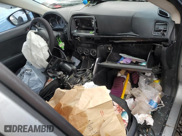 2014 Mazda CX-5 Sport with VIN JM3KE4BE2E0360024, listed as a Copart auction lot 47014035 with Not provided miles and Salvage title. Bid and sale history available at DreamBid. Image 8.