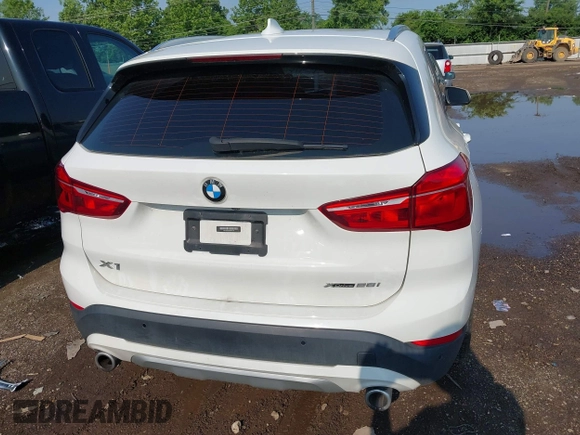 2021 BMW X1 xDrive28i with VIN WBXJG9C02M3M42379, listed as a IAAI auction lot 42476221 with 60,412 mi miles and . Bid and sale history available at DreamBid. Image 17.