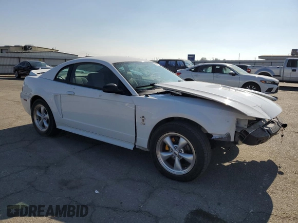 2002 Ford Mustang Standard with VIN 1FAFP40452F182431, listed as a Copart auction lot 79667594 with 66,892 mi miles and Salvage Title. Bid and sale history available at carsss.com. Image 4.