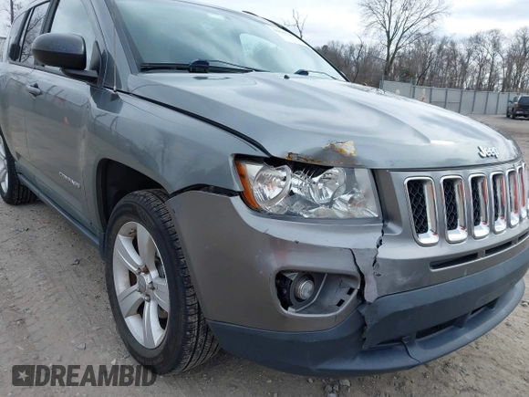 2011 Jeep Compass with VIN 1J4NF1FB1BD251618, listed as a IAAI auction lot 41633368 with 125,326 mi miles. Bid and sale history available at carsss.com. Image 6.