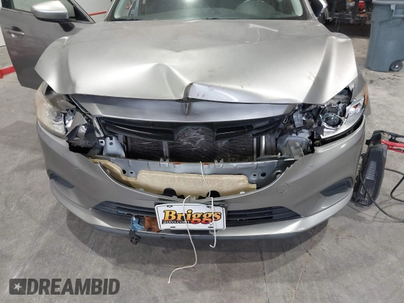 2014 Mazda 6 i Touring with VIN JM1GJ1T51E1106970, listed as a IAAI auction lot 42027350 with 113,756 mi miles and . Bid and sale history available at DreamBid. Image 6.