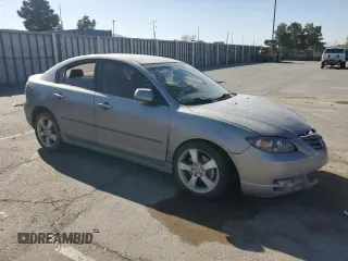 2005 Mazda 3 s with VIN JM1BK123051308514, listed as a Copart auction lot 51306365 with 185,771 mi miles and Salvage Title. Bid and sale history available at DreamBid. Image 4.