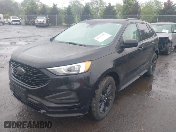 2022 Ford Edge SE z VIN 2FMPK4G94NBA99279, wystawiony jako IAAI lot #42351490 z przebiegiem 30 044 mil mil oraz . Historia ofert i sprzedaży dostępna na DreamBid. Obrazek 2.