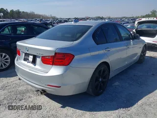 2014 BMW 3 Series 335i xDrive with VIN WBA3B9G52ENR91044, listed as a IAAI auction lot 41807408 with 200,000 mi miles and . Bid and sale history available at carsss.com. Image 4.