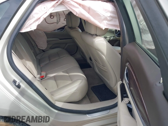2013 Cadillac XTS Luxury with VIN 2G61P5S30D9132193, listed as a IAAI auction lot 41897709 with 140,780 mi miles and . Bid and sale history available at DreamBid. Image 8.