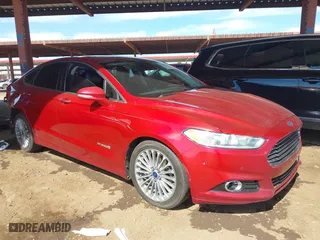 2014 Ford Fusion Titanium Hybrid with VIN 3FA6P0RU7ER128390, listed as a IAAI auction lot 41653460 with 137,739 mi miles. Bid and sale history available at carsss.com. Image 1.