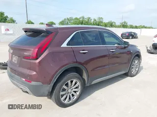 2023 Cadillac XT4 FWD Premium Luxury with VIN 1GYFZCR47PF106017, listed as a IAAI auction lot 42283401 with 40,734 mi miles and . Bid and sale history available at DreamBid. Image 4.