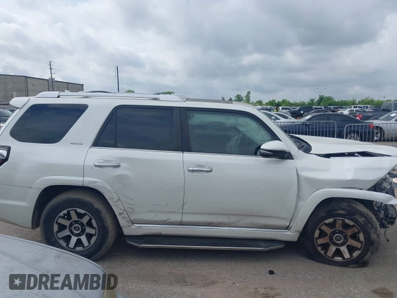 2014 Toyota 4Runner SR5 with VIN JTEZU5JR7E5080554, listed as a IAAI auction lot 42134833 with 170,077 mi miles and . Bid and sale history available at DreamBid. Image 14.