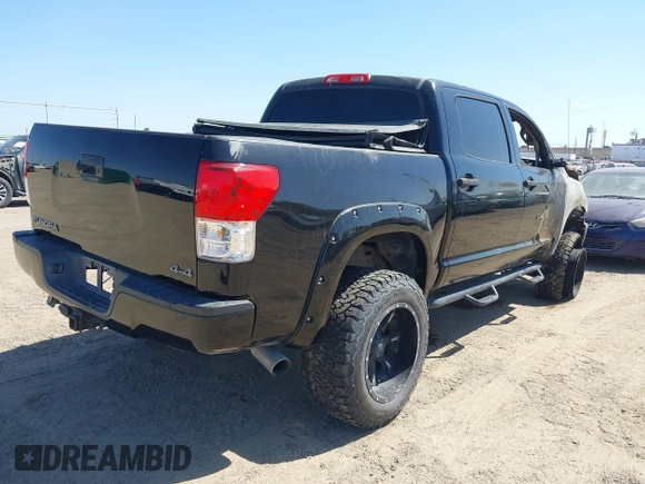 2011 Toyota Tundra 4WD Truck with VIN 5TFDW5F11BX182122, listed as a IAAI auction lot 41776414 with 1 mi miles. Bid and sale history available at carsss.com. Image 4.
