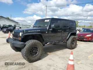 2014 Jeep Wrangler Unlimited Rubicon X with VIN 1C4HJWFG0EL142071, listed as a Copart auction lot 72898994 with 110,597 mi miles and Salvage title. Bid and sale history available at DreamBid. Image 1.