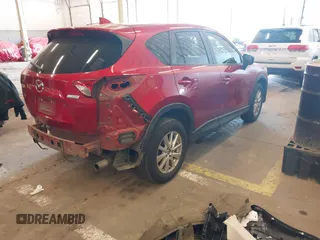 2016 Mazda CX-5 Sport z VIN JM3KE2BY3G0684861, wystawiony jako IAAI lot #42050897 z przebiegiem 165 688 mil mil oraz . Historia ofert i sprzedaży dostępna na DreamBid. Obrazek 4.