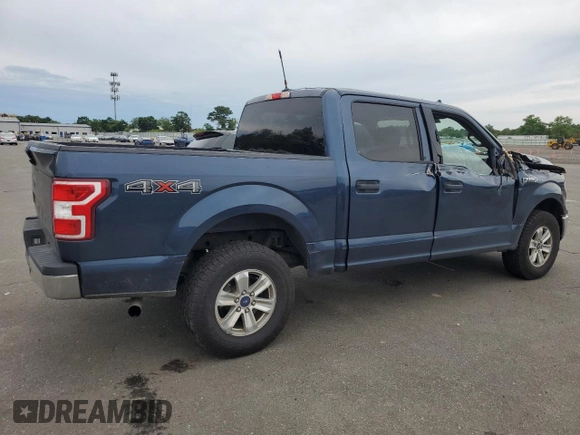 2019 Ford F-150 XL with VIN 1FTEW1E55KFC10642, listed as a Copart auction lot 62811755 with 128,286 mi miles and Salvage title. Bid and sale history available at DreamBid. Image 3.