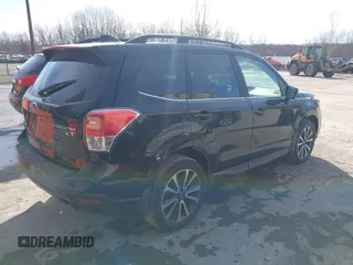 2017 Subaru Forester Premium with VIN JF2SJGEC9HH594118, listed as a IAAI auction lot 41634787 with 147,086 mi miles. Bid and sale history available at carsss.com. Image 4.