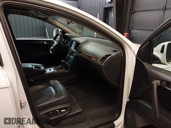 2013 Audi Q7 Premium Plus with VIN WA1LGAFE1DD009705, listed as a IAAI auction lot 41390712 with 99,649 mi miles and . Bid and sale history available at DreamBid. Image 5.