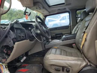 2004 Hummer H2 with VIN 5GRGN23U04H116668, listed as a Copart auction lot 70402334 with 0 mi miles and Salvage Title. Bid and sale history available at carsss.com. Image 7.