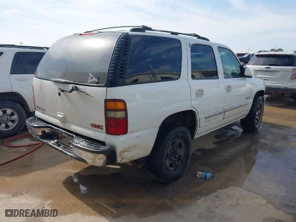 2002 GMC Yukon SLT with VIN 1GKEC13V02R300098, listed as a IAAI auction lot 41583951 with 247,780 mi miles. Bid and sale history available at carsss.com. Image 4.